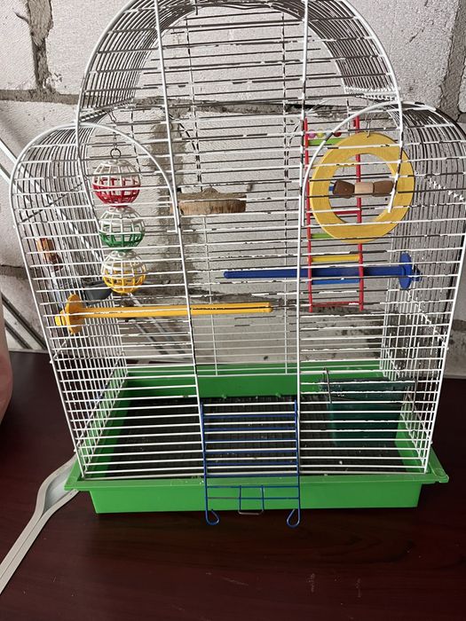 Клітка для папуги з усім наповненням