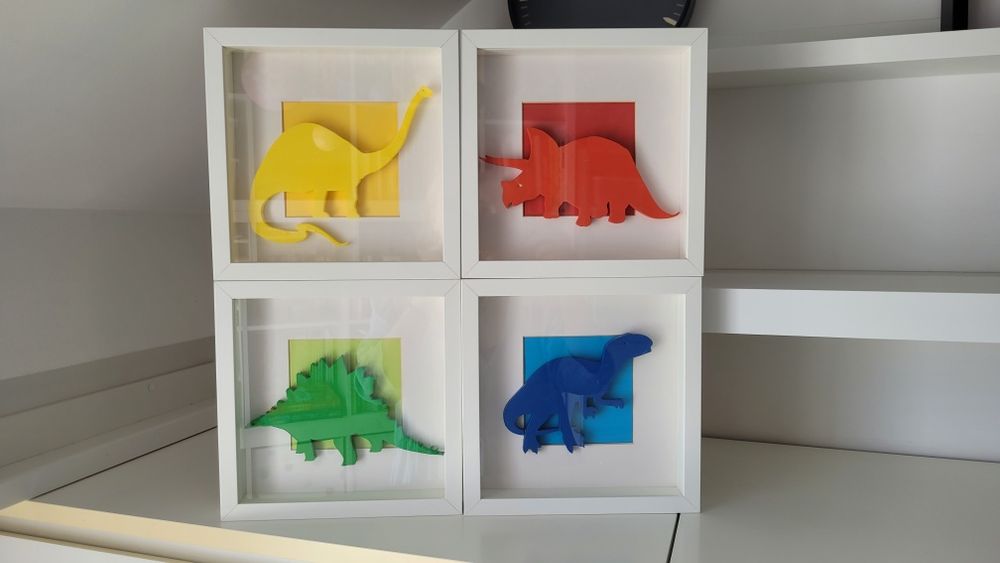 Obrazki Dinozaury kolorowe 3d w białych ramkach 4sztuki