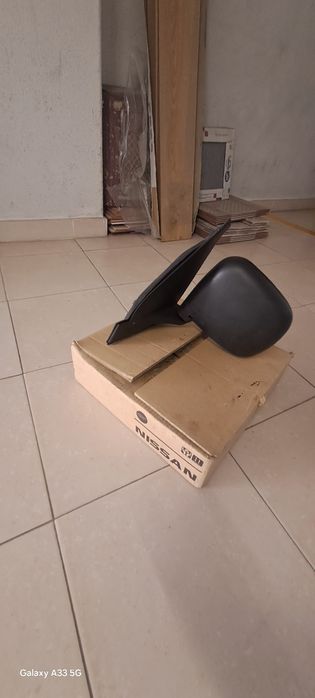 Retrovisor nissan vanette..