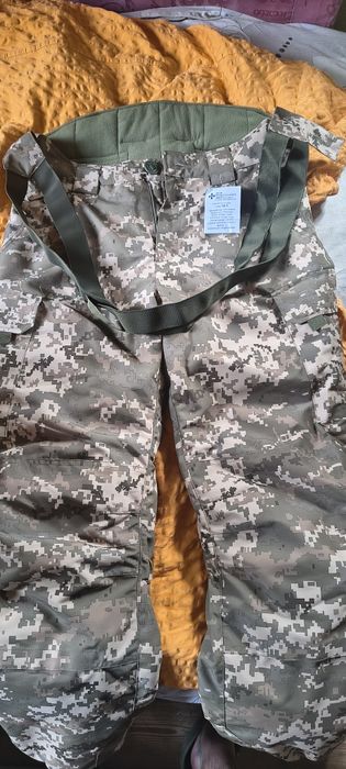 Продам штаны зимние ветрозащитные пиксель