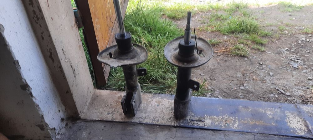 Амортизатор стійка Пежо 3008 5008