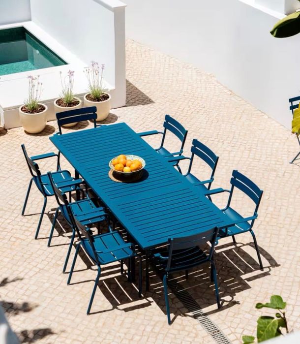 FERMOB extendable garden table including 8 chairs with armrests