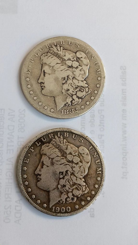 2 moedas de prata 900 de dólar de 1882 e 1900