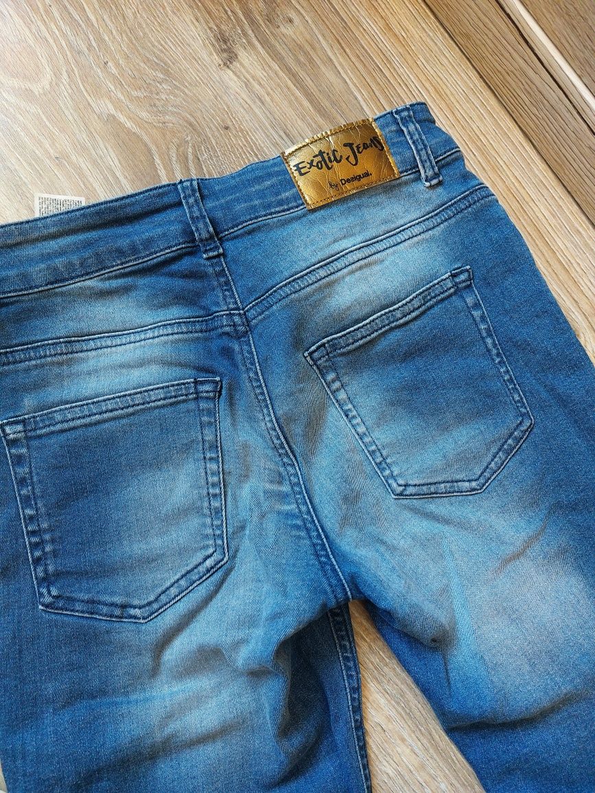 Spodnie jeans desingual 28