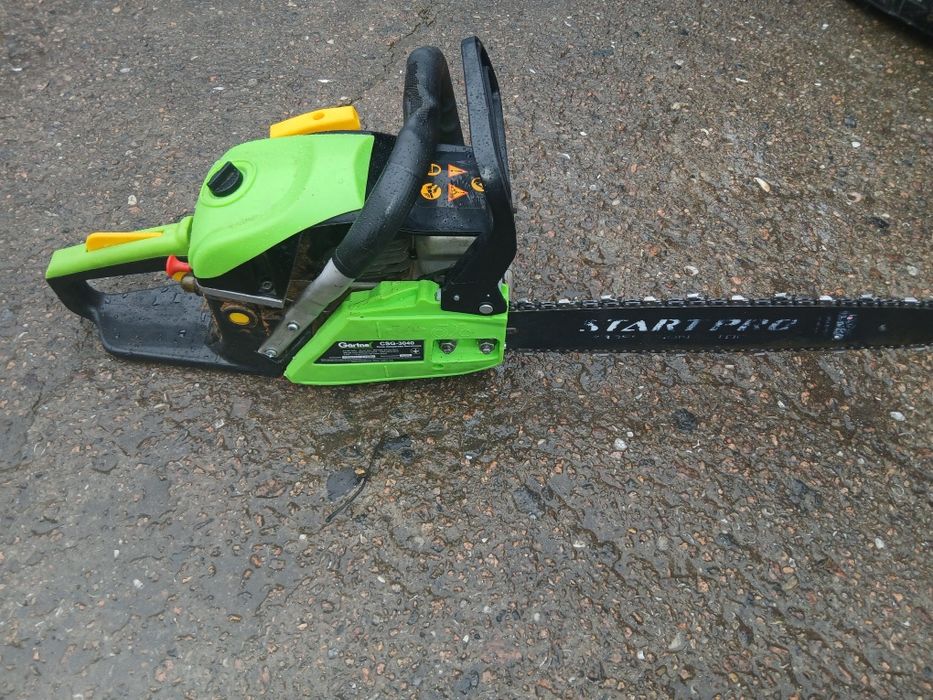 Бензопила с шиной и цепкой