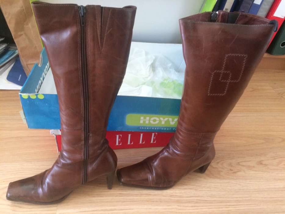 Botas altas pele