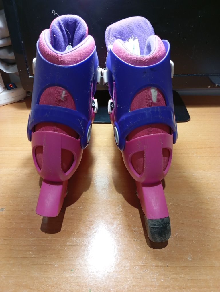 Patins em linha rosa