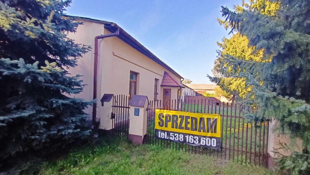 Nieruchomość zabudowana dom i budynki gospodarcze w Raciążu