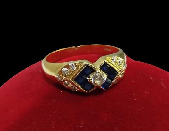 Piękny złoty pierścionek z granatowymi kamieniami 14K 3,82G ROZMIAR 16
