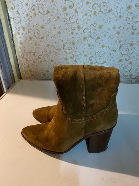Botas cano alto Novas