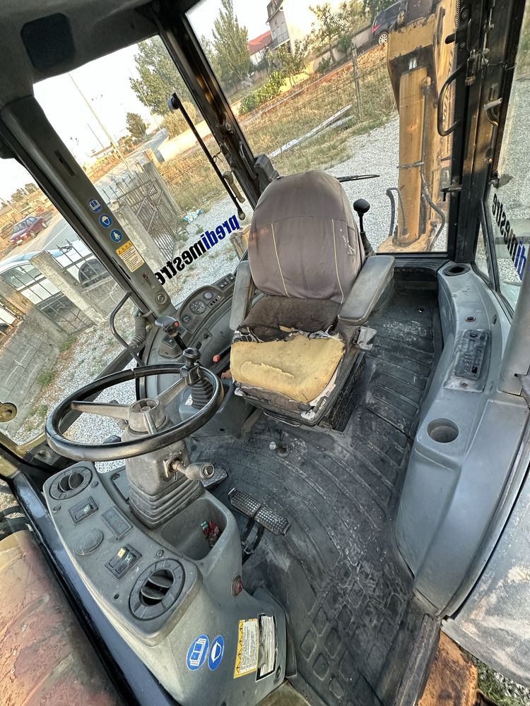 Retroescavadora new holland nh85