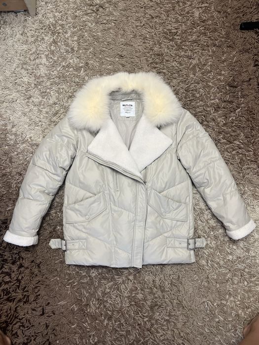Жіночий пуховик розмір S 42