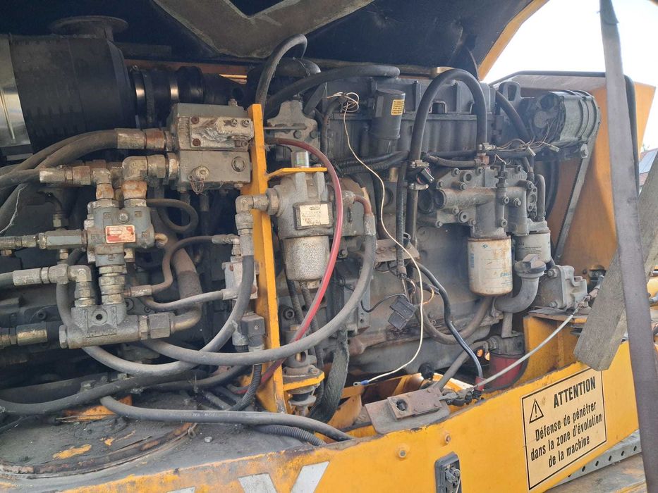 Koparko ładowarka Cat, Case, JCB