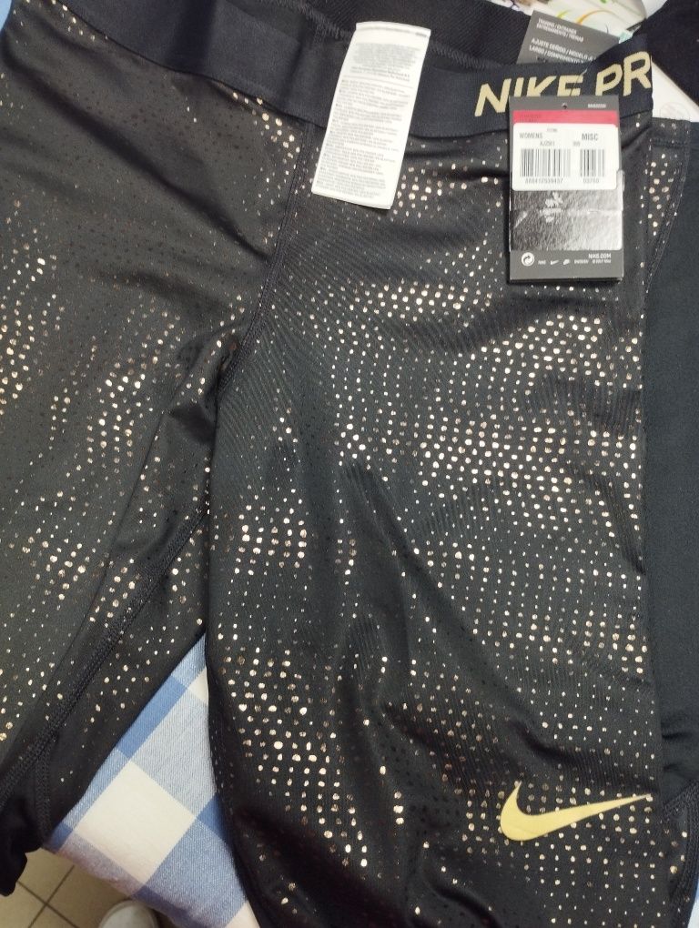 Nike legginsy L czarne ze złotym