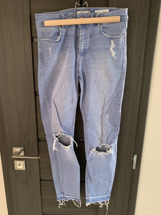 Spodnie jeansowe ZARA z dziurami jasny jeans rozmiar S