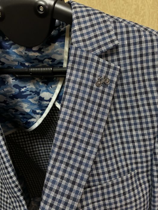 Стильний піджак у клітинку в чудовому стані