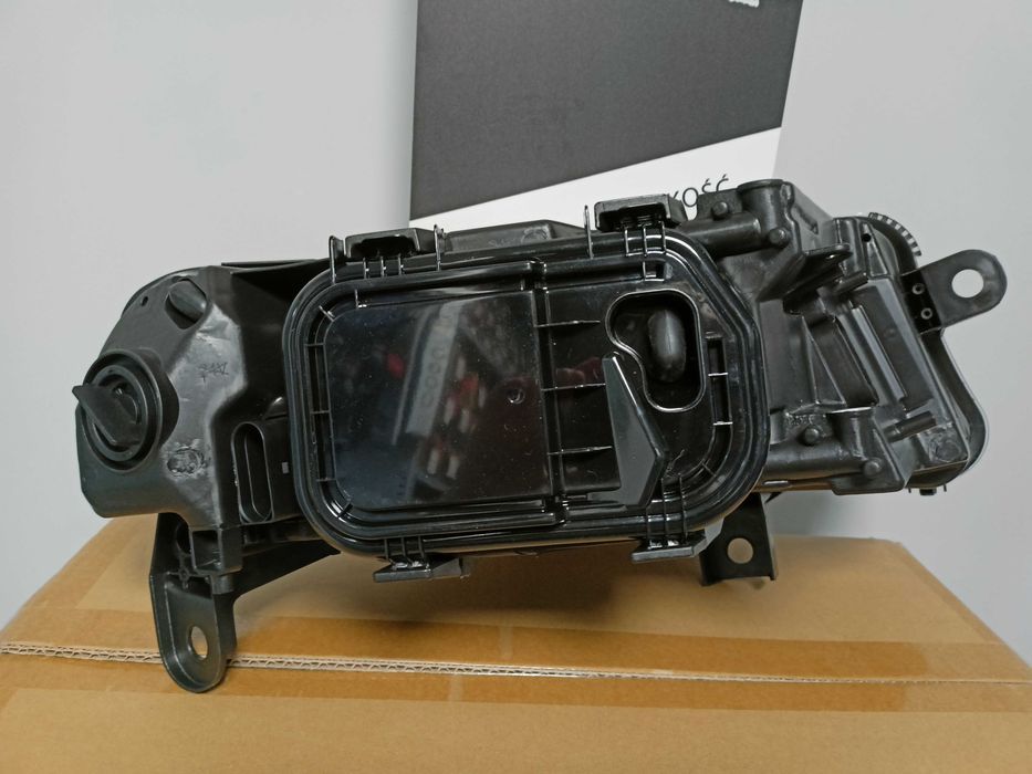 Audi A6 C6  04-10.2008 Lampa/Reflektor przód lewy /H1+H7