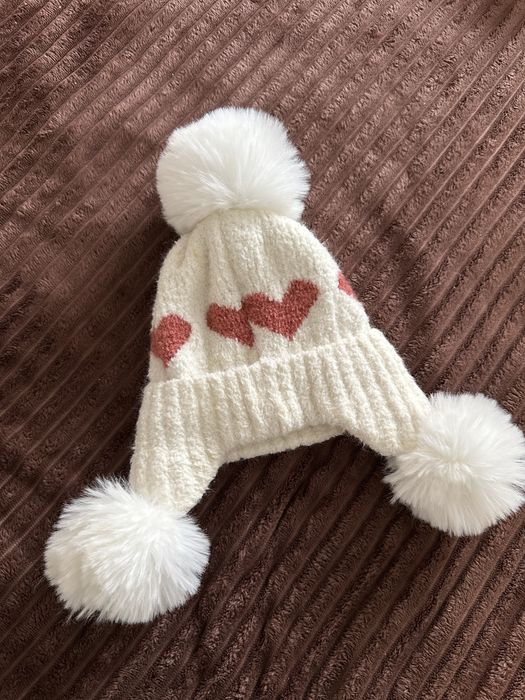 Теплі зимові шапочки