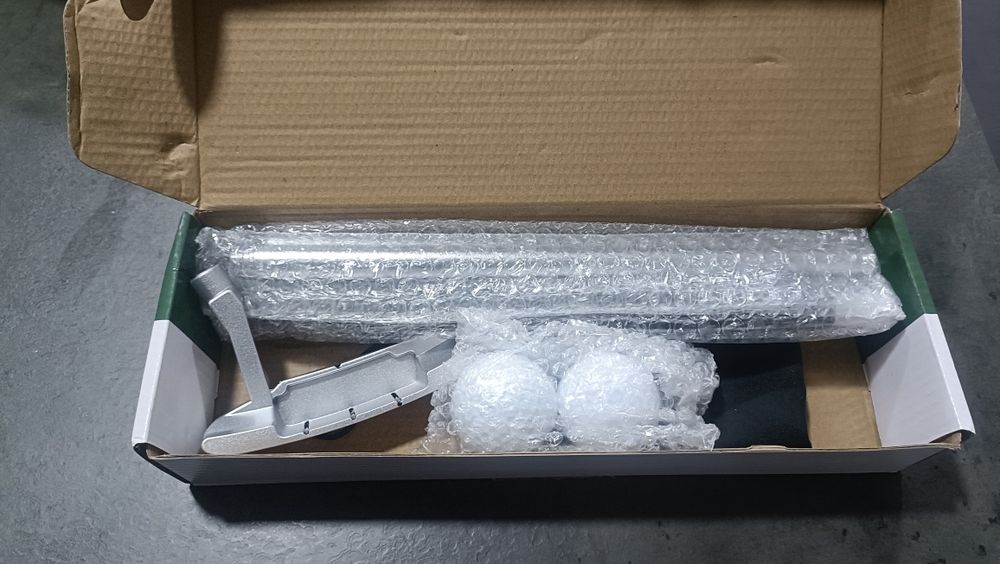 Taco de golfe e bolas