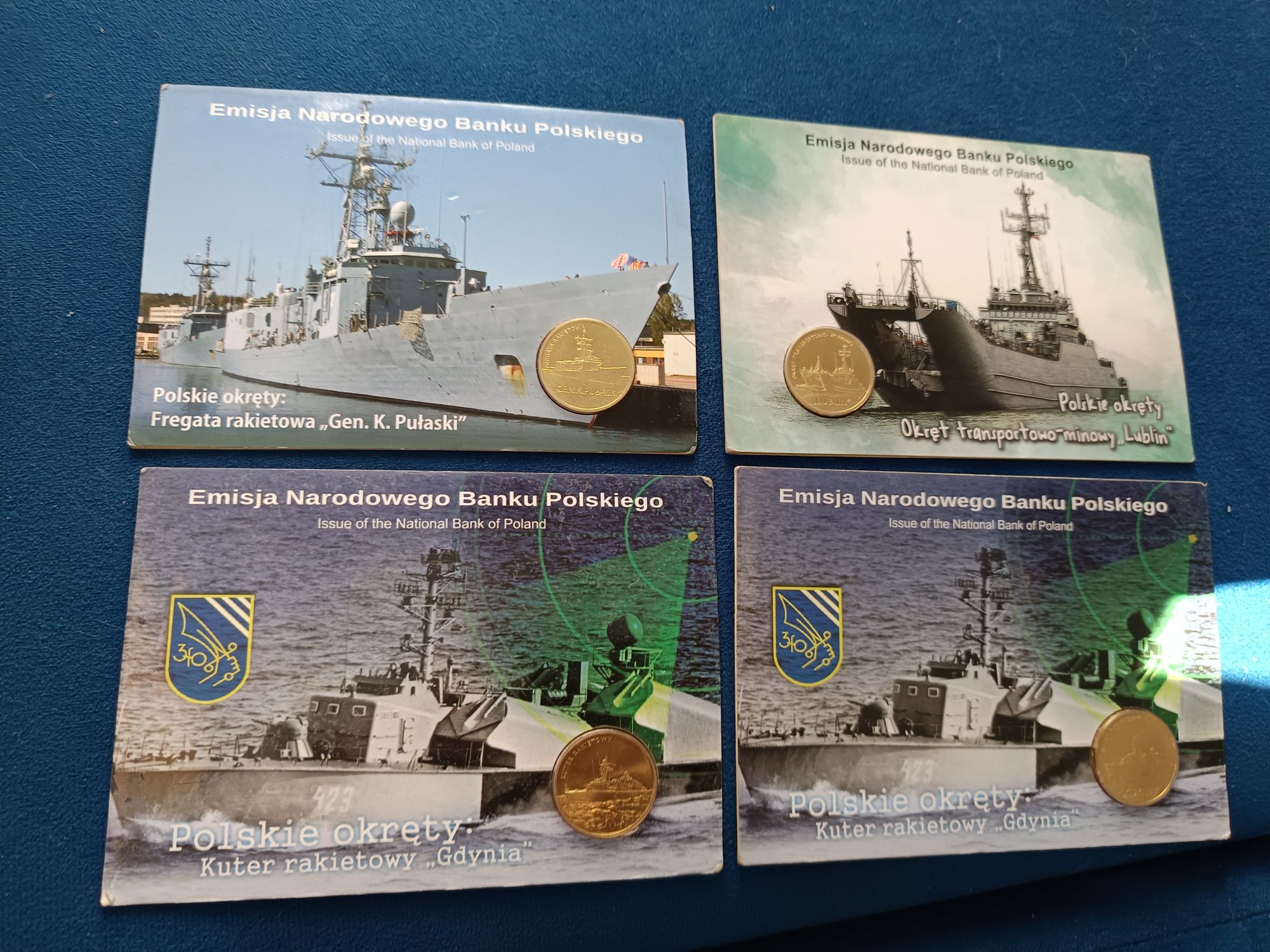 Numizmatyka 8 monet 2 zł polskie okręty i Gdynia z kartami