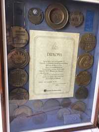 quadro com medalhas antigas dos tlp