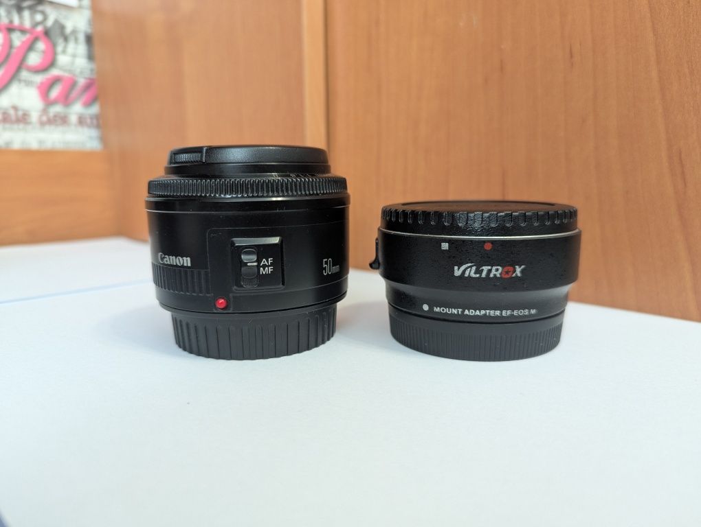 Canon m50 + Kit 15-45 + 50mm 1.8
-canon EF 50mm f/1.8