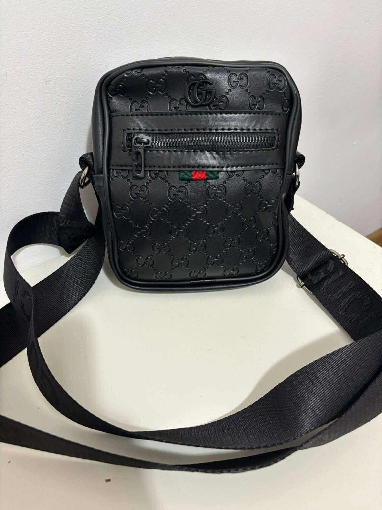 Gucci saszetki meskie