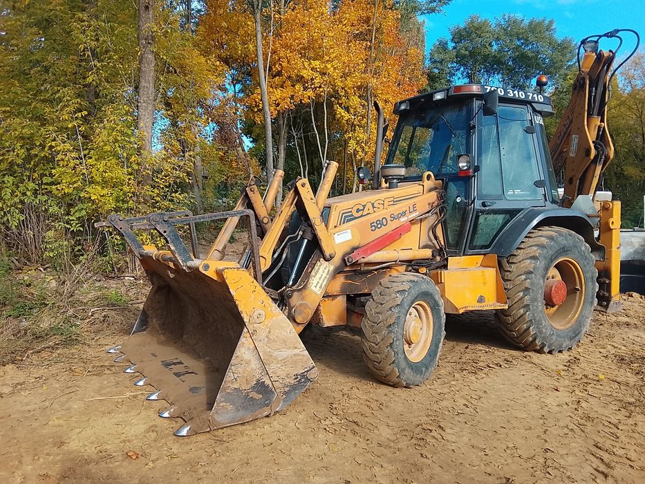 Uskugi Koparko-ładowarka Koparka kołowa – wykopy, niwelacje, komplekso