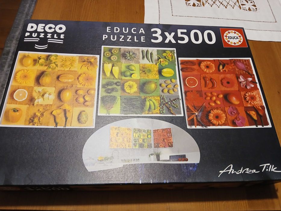 Caixa com 3 puzzles novos