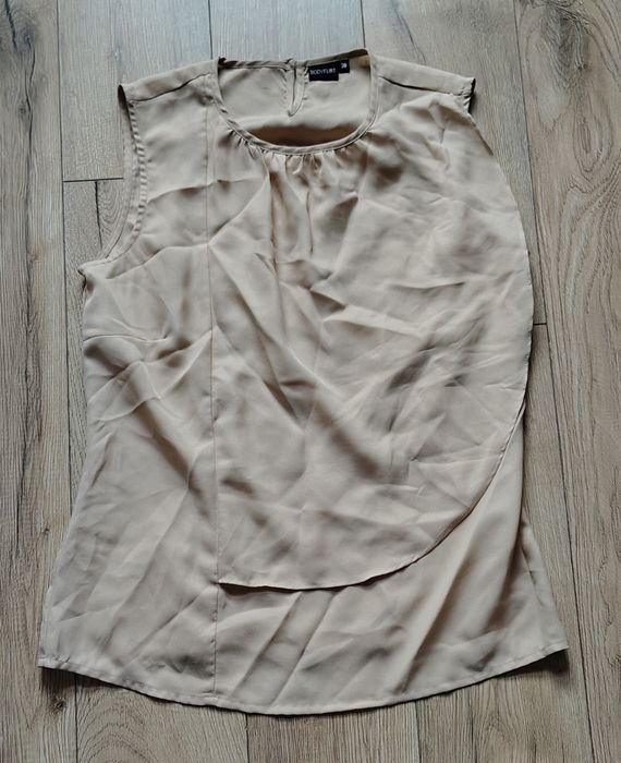 Koszulka bez rękawów damska beżowa 38