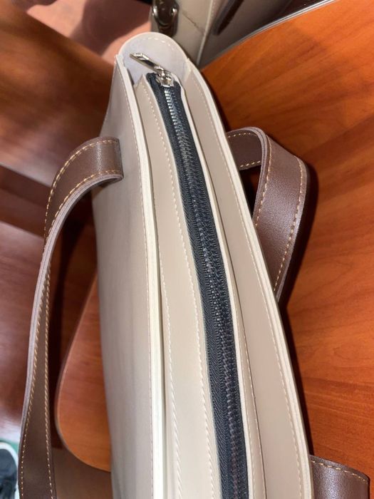 Жіноча напівкругла сумка