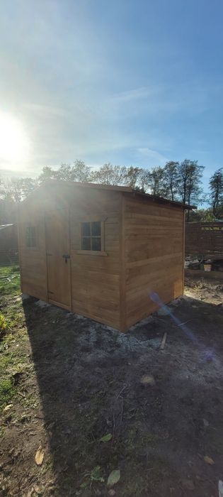 Domki narzędziowe na narzędzia drewutnie place zabaw huśtawki