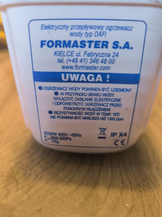 Elektryczny przepływowy ogrzewacz wody Dafi 9000w. Stan bdb.