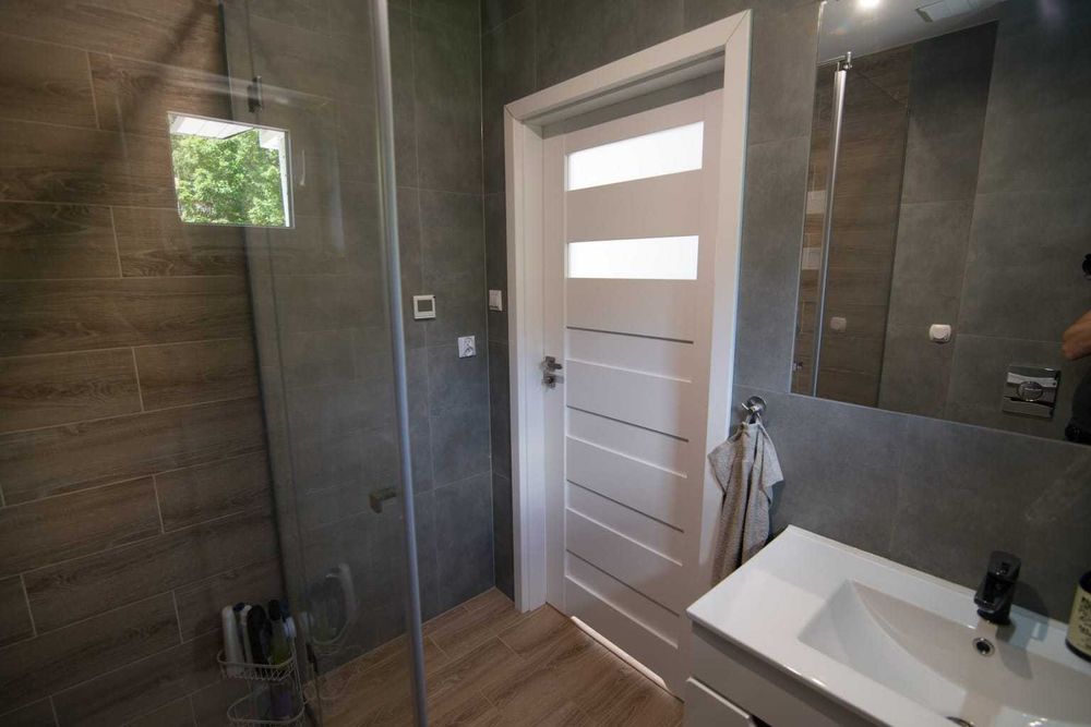 Całoroczny dom nad jeziorem SEN MAZUR z sauną, jacuzzi ,własną plażą