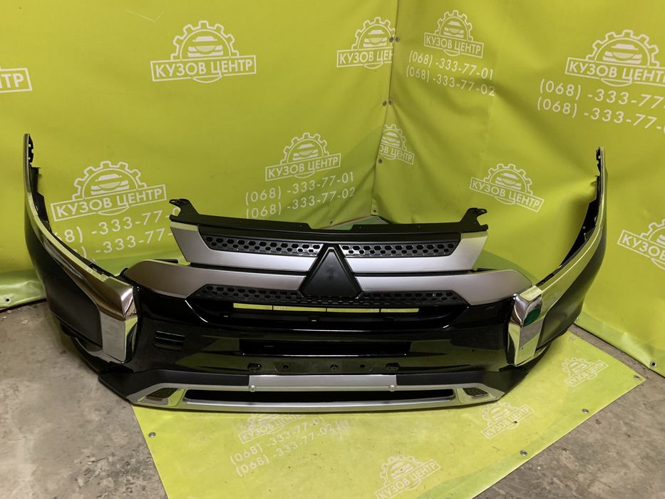Бампер передний Mitsubishi Outlander  2018 2019 2020 2021 решетка губа