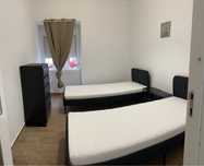 Quarto partilhado disponível (Mulheres)