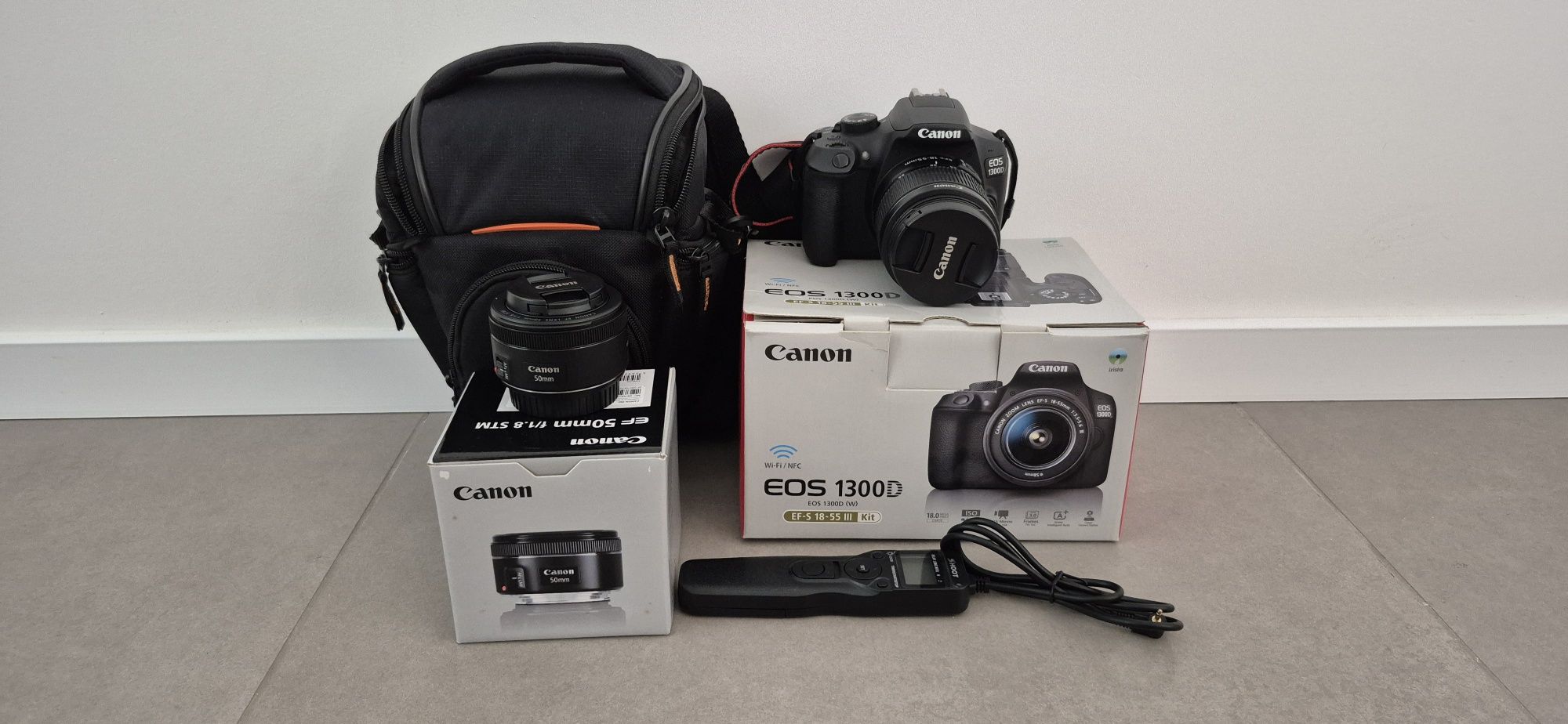 Canon 1300D + 50mm + comando disparo + mala