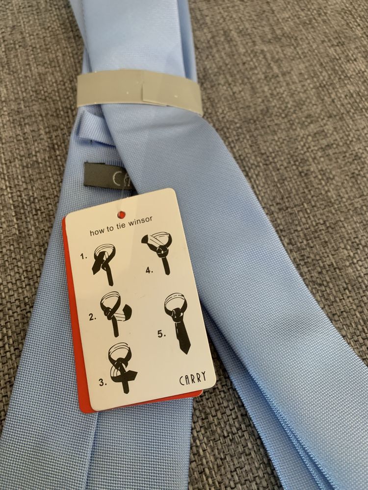 Męskie krawaty. Nowe