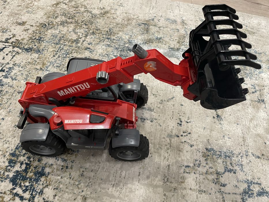 Телескопічний навантажувач Manitou типу BRUDER