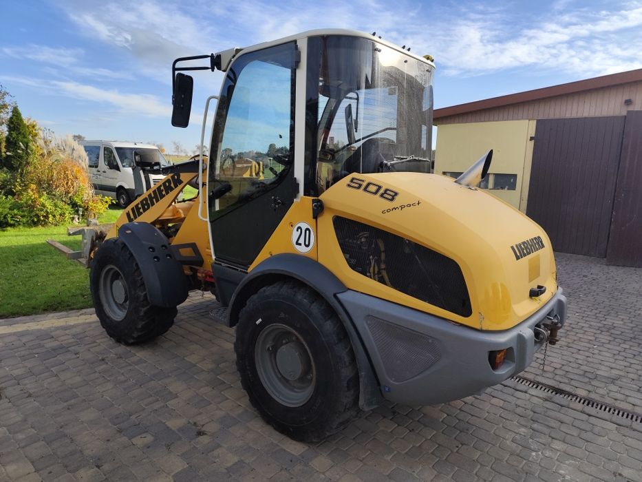 Ładowarka liebherr 508 cat jcb