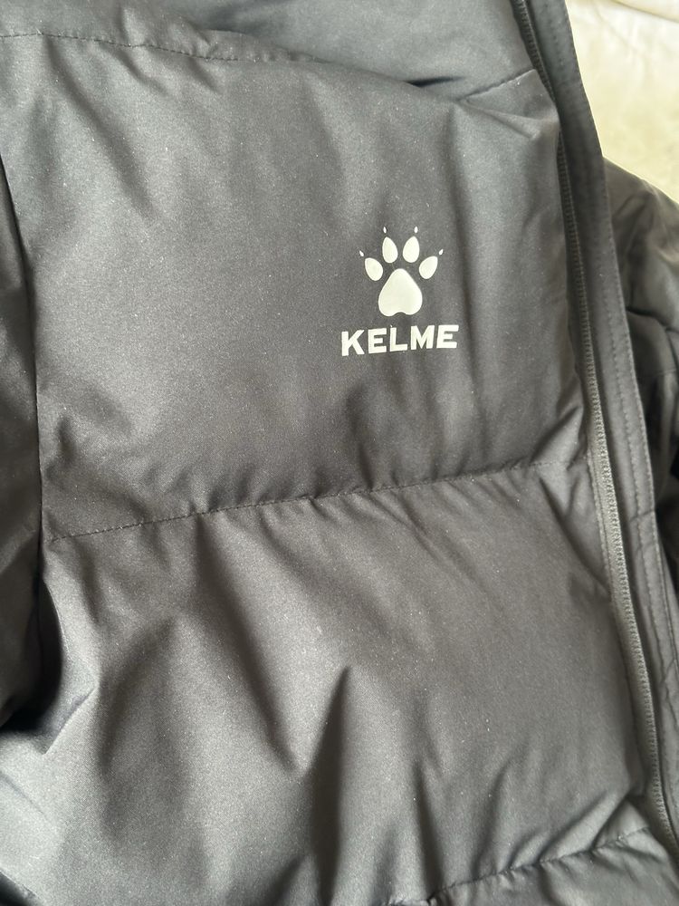 Продам длинную зимнюю куртку Кelme