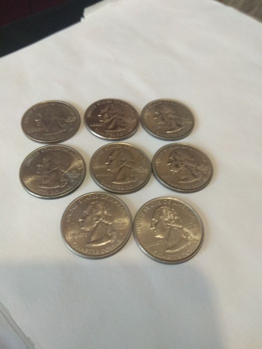 Монеты ( квотеры) США