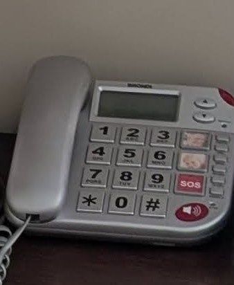Telefone com telecomando SOS e pendente SOS