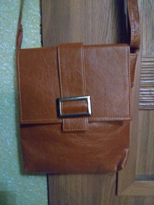 Mała Listonoszka na długim pasku