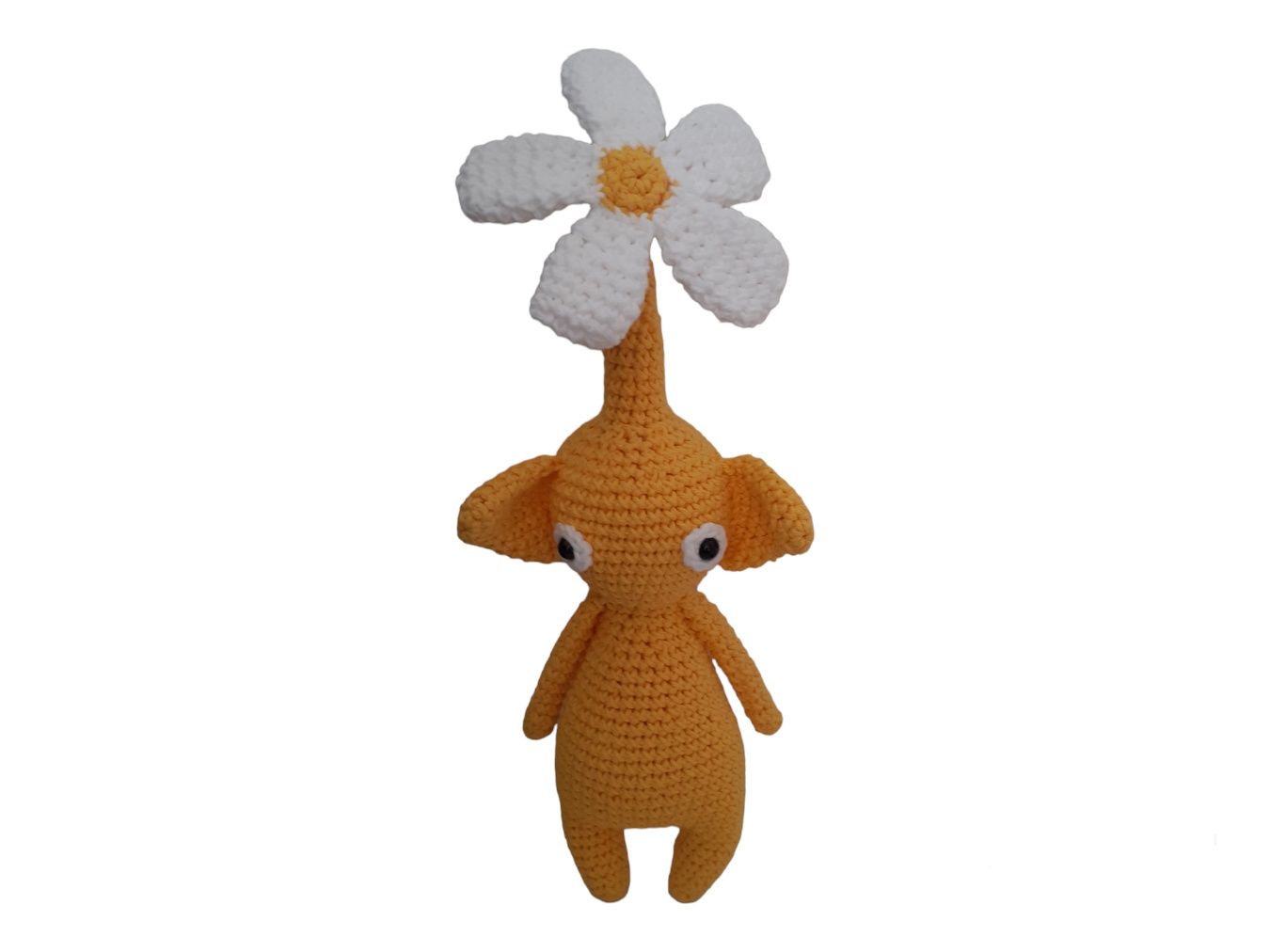 Pikmin amarelo com flor em crochet amigurumi
