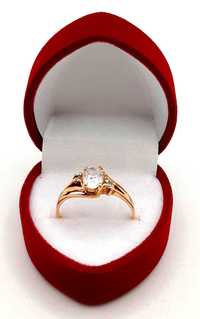 Złoty pierścionek z Cyrkoniami PR.583 W:2,36gr R.15 ,