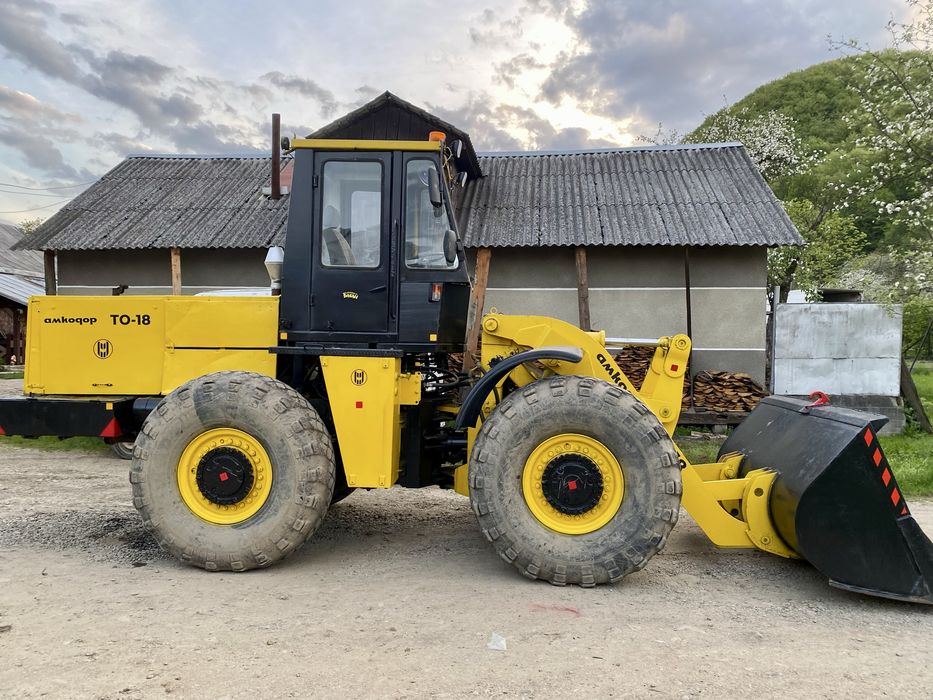 Амкадор ТО-18 навантажувач