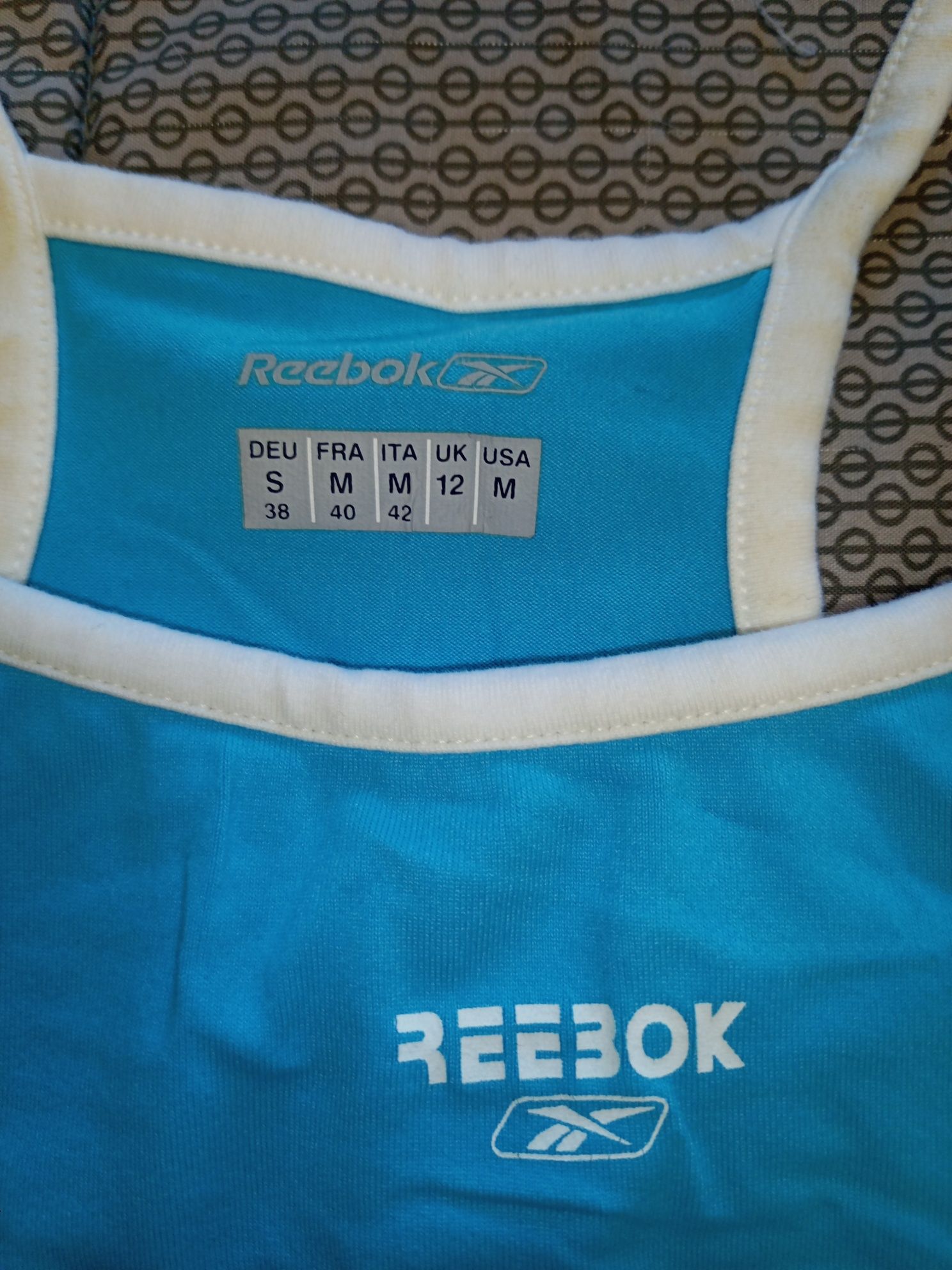 Майка REEBOK, спортивная, голубая+белым, 46 размер
Размер укр.