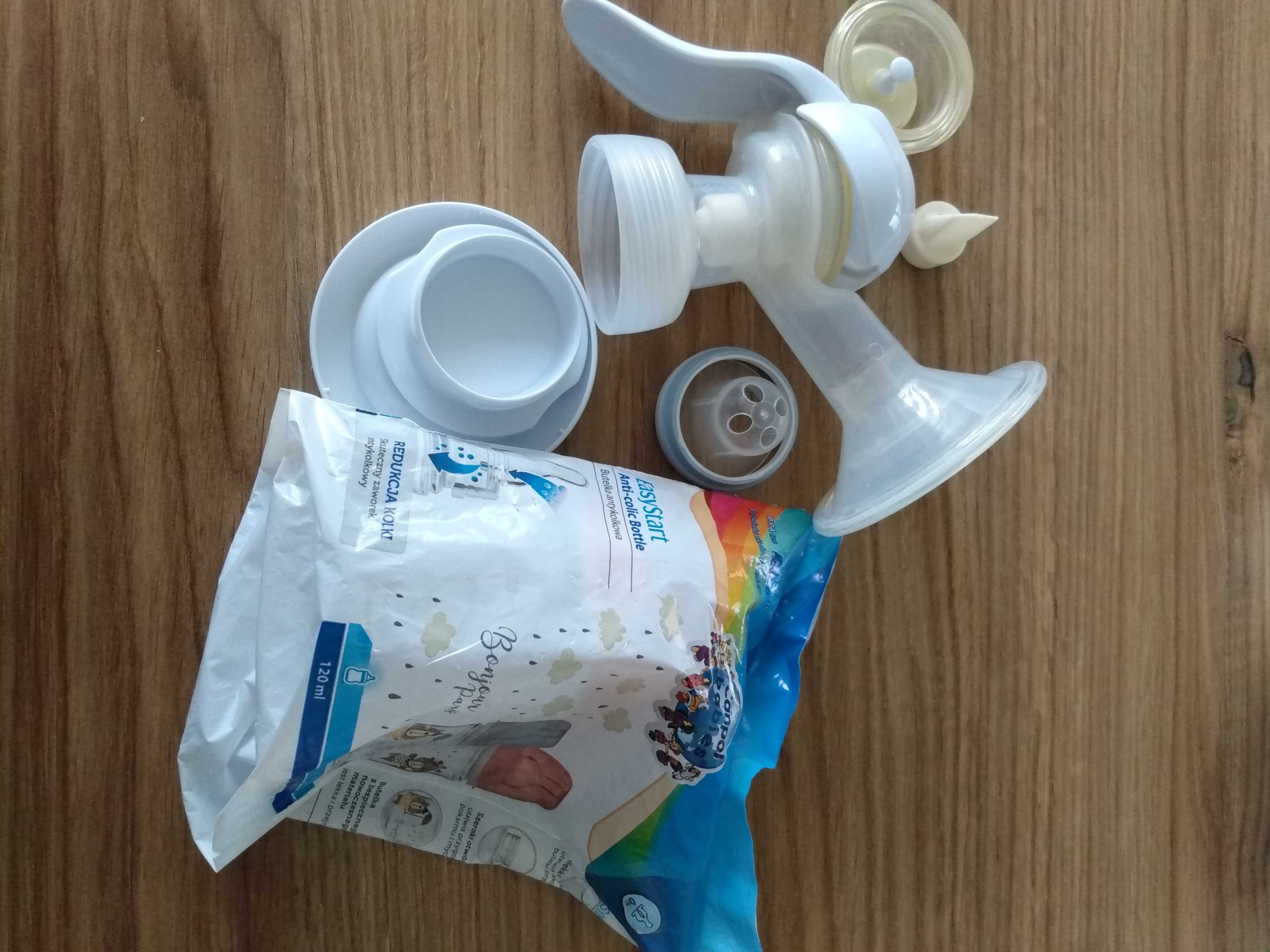 Laktator ręczny plus butelka Canpol 120 ml nowa