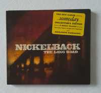 Płyty CD zespołu Nickelback.